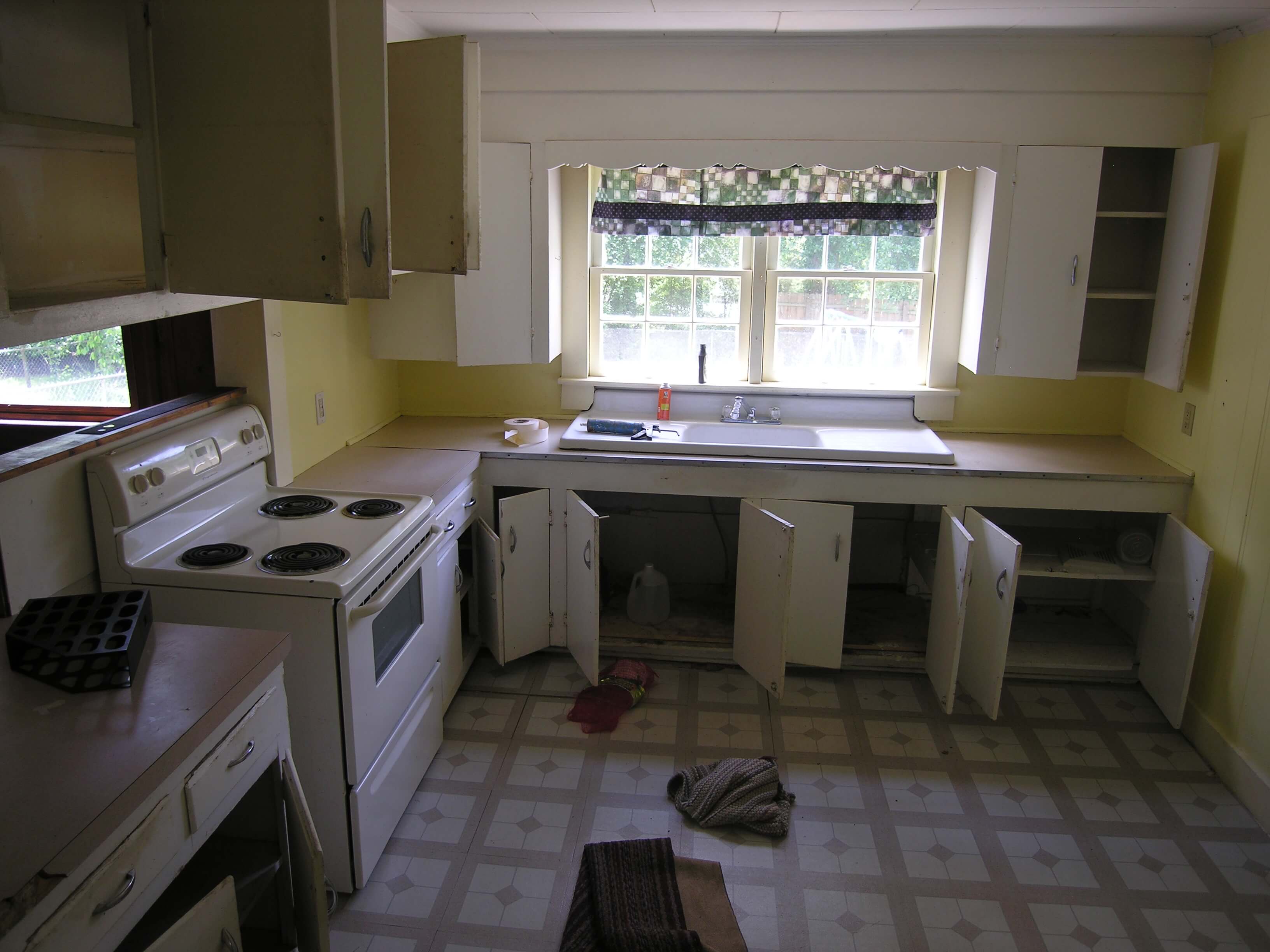 rent house appreciation - kitchen - before