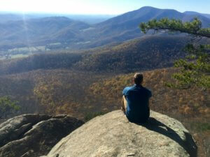 investing in expensive market - Guy on Fire - view over Appalachian mountains