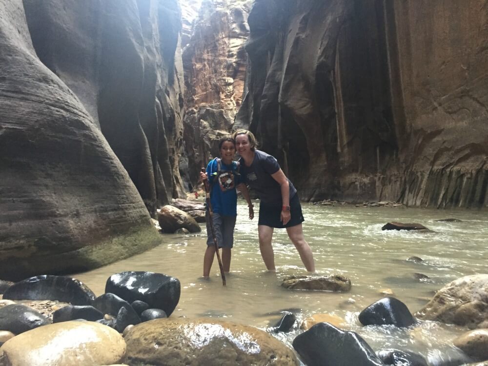 Financial Independence at 44 Years-Old Using Real Estate Crowdfunding - Kiddo and I hiking Narrows at Zion National Park.