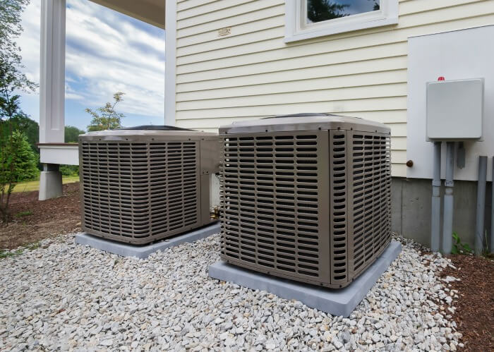 Ultimate Guide to HVAC Systems For Rental Properties - compressors outside