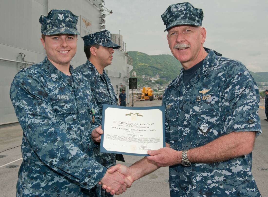 receiving award Navy - From Enlisted in the Navy to 35 Rentals in Only 11 Years