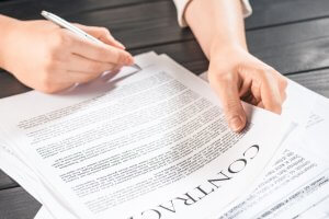 signing a real estate contract - how to buy an investment property