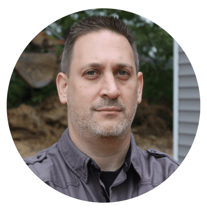 J Scott - head shot - circle png