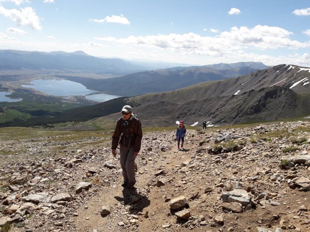 Chris Mamula and family hiking together